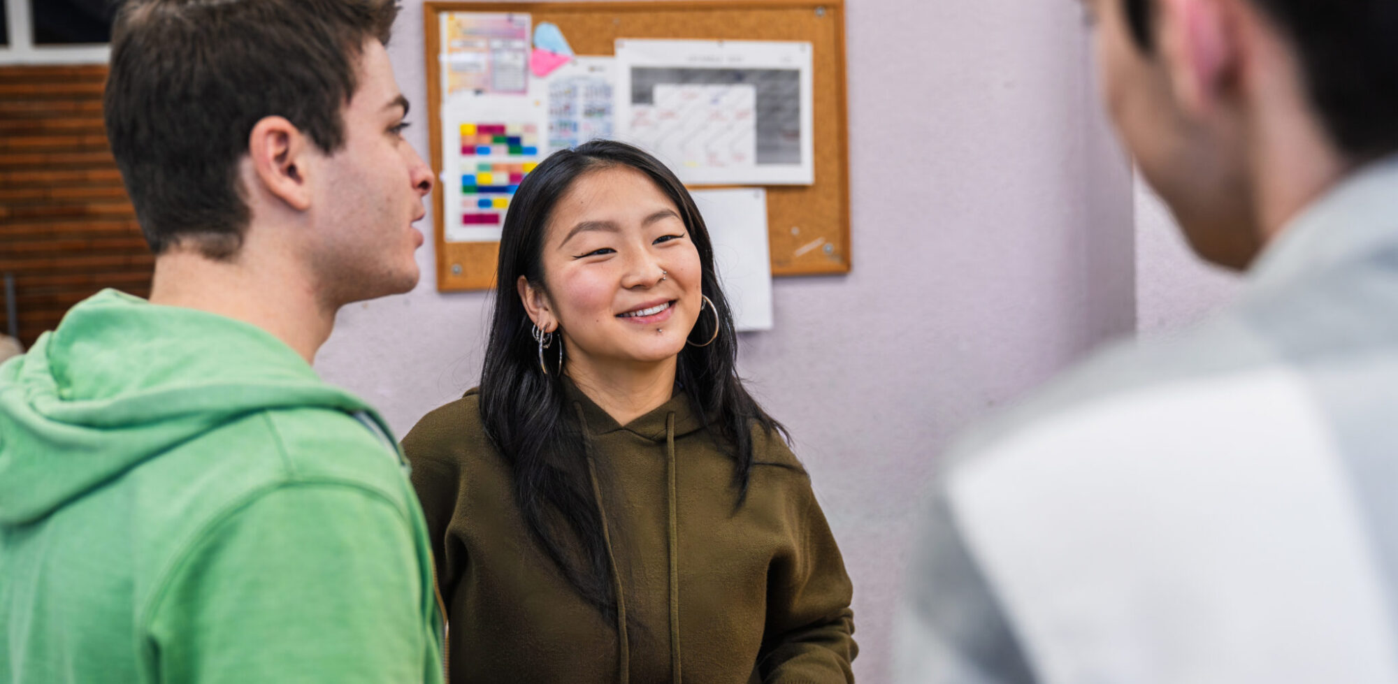 High School Students Chatting Together In Classroom